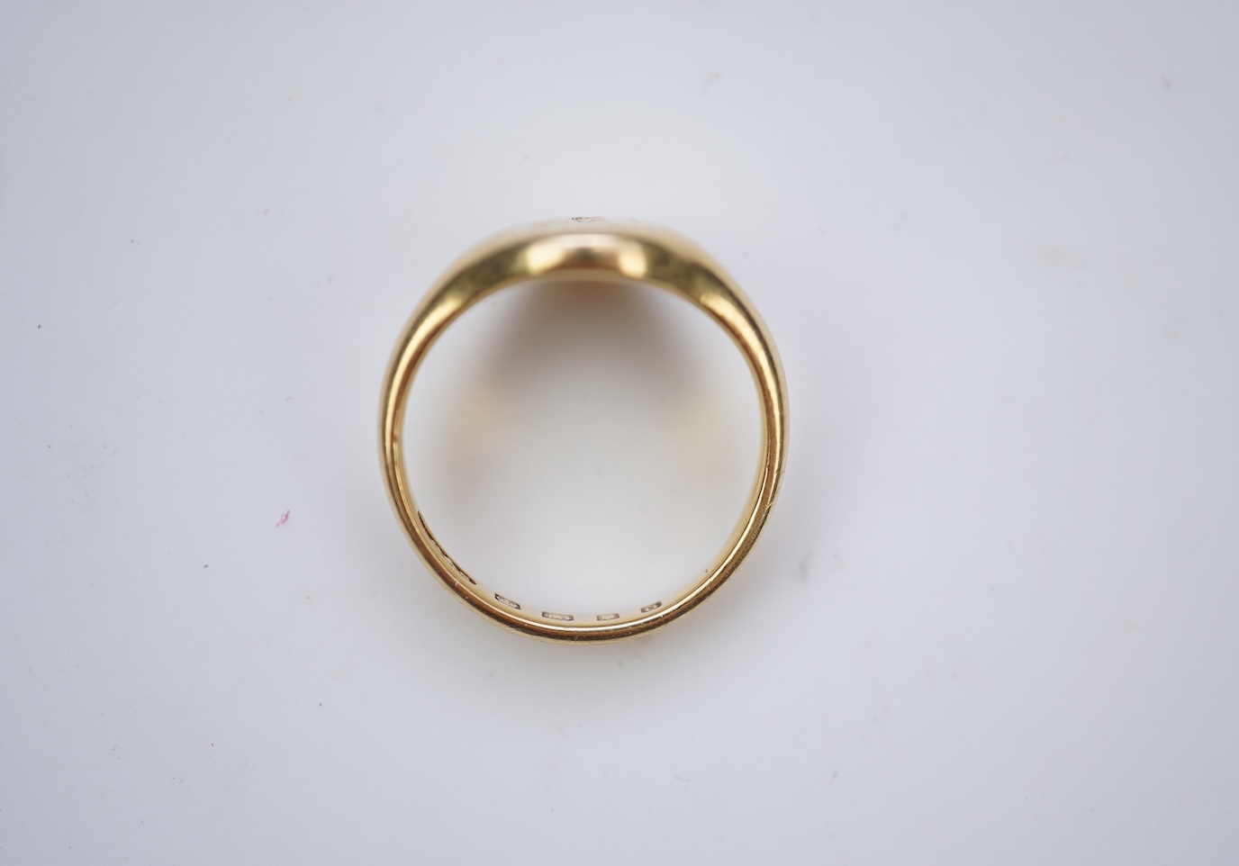 An 18ct gold signet ring, circa 1929